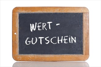 Old school blackboard with the term WERTGUTSCHEIN
