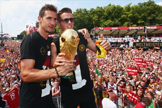 Miroslav Klose and Erik Durm with the trophy