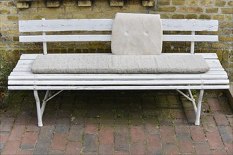 Bench with a cushion