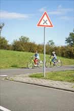 Children on bicycles at a traffic awareness course