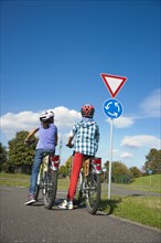 Children on bicycles at a traffic awareness course