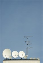 Satellite dishes on rooftop