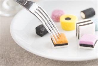 Liquorice candy served on a plate