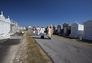 Archbishop Gregory Aymond leads the Blessing of the Graves at St. Louis #3 Cemetery on All Saints Day