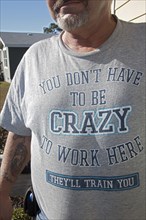 Man wearing a T-shirt with the message