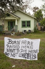 A resident's a homemade sign displays frustration after the small town of Jean Lafitte was flooded by Hurricane Isaac