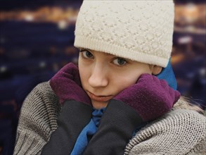 Girl wearing a hat and a scarf