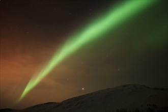 Northern Lights over the Kattfjord pass in winter