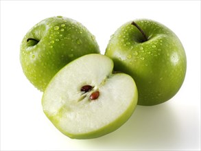 Whole and cut Granny Smith apples