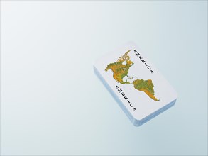 Deck of playing cards with a map of North America and South America