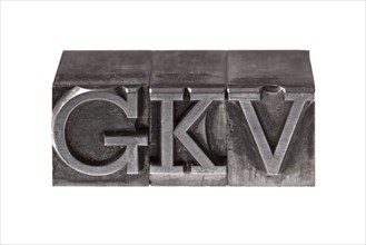 Old lead letters forming the acronym 'GKV'