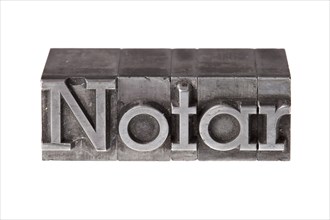 Old lead letters forming the word 'Notar'