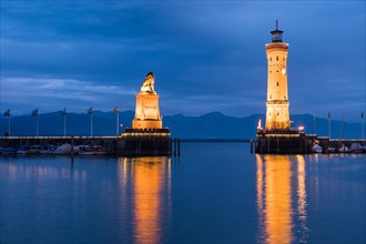 Bavarian lion and lighthouse in the harbour