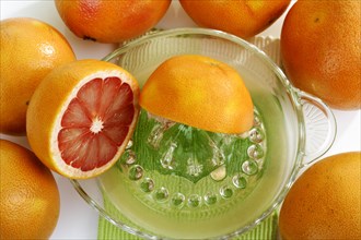 Ruby grapefruit with citrus press