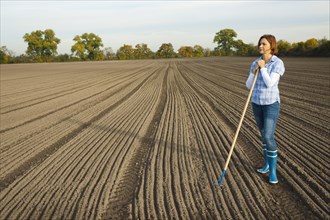 Farmer working in her field