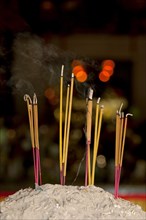 Lit incense sticks