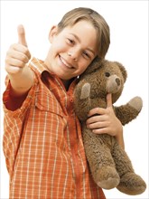Boy holding a teddy bear