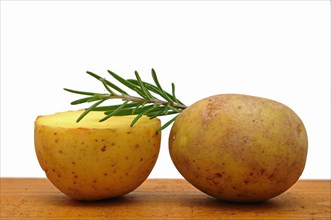 Potatoes with rosemary twig