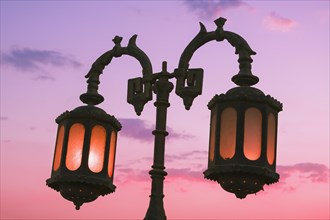 Lamp post at dusk in the city of Dahab