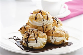 Plate of cream puffs