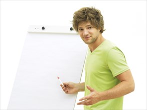 Man standing in front of a flip chart