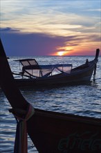 Boats at sunset from sunset beach on Ko Lipe