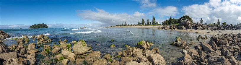 Sandy beach beach of Mount Manganui with island Motiti Island