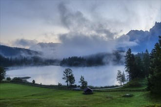 Waft of mist at Lake Lautersee at dawn