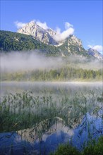 Lake Ferchensee and Wettersteinspitze with early fog