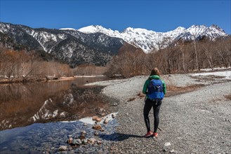 Young woman at a lake