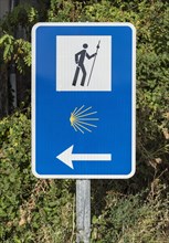 Camino de Santiago road sign with shell symbol