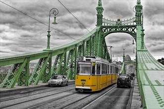 Freedom Bridge with yellow tram