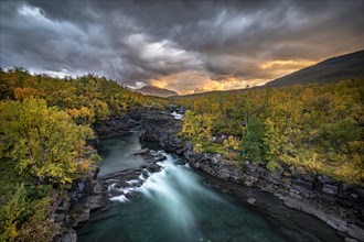 Autumn Abisko Canyon with dramatic lighting