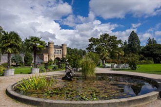 Water lily basin in front of the arched building