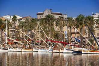 Sailing boats and fishing boats in the port of Bandol