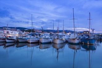 Boats in the port of Saint Tropez in the evening