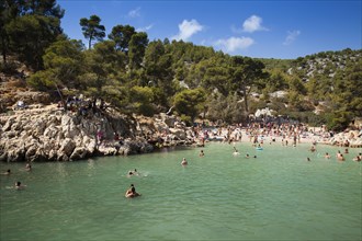 Beach vacationers at the beach in the bay Calanque de Port-Pin