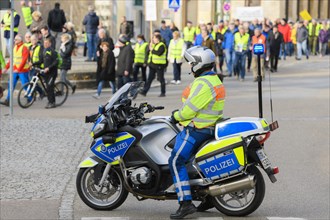 Police officer on motorcycle at demonstration against the ban on diesel driving from 01.02.2019 in Stuttgart
