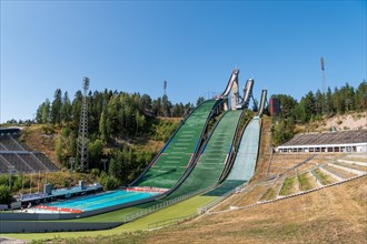 Ski jumps with outdoor pool