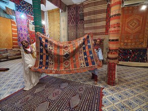 Carpet dealers present Berber carpets