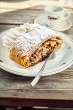 Apple strudel with coffee