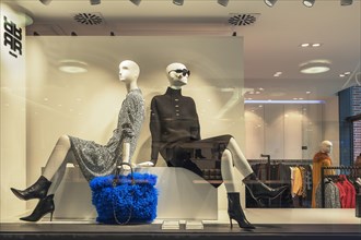 Shop window with fashion dolls