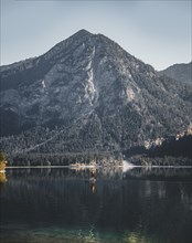 Stand-up-Paddler on Lake Heiterwanger