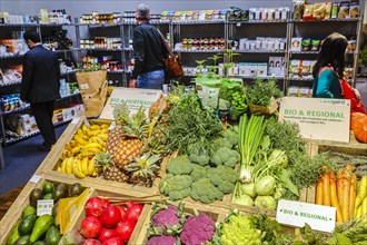 Organic vegetables and organic fruit at a vegetable counter