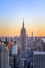 View of Midtown and Downtown Manhattan and Empire State Building from Top of the Rock Observation Center at sunset