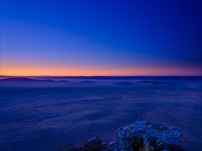 View from a summit to Mongolian steppe at blue hour