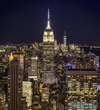 View of Midtown and Downtown Manhattan and Empire State Building from Top of the Rock Observation Center at Night