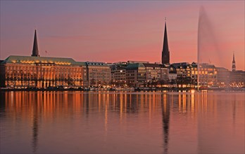 Inner Alster Lake with Alster fountain at dusk