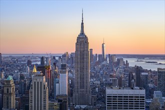 View of Midtown and Downtown Manhattan and Empire State Building from Top of the Rock Observation Center at sunset