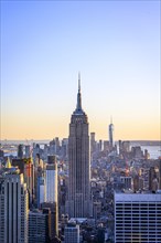 View of Midtown and Downtown Manhattan and Empire State Building from Top of the Rock Observation Center at sunset